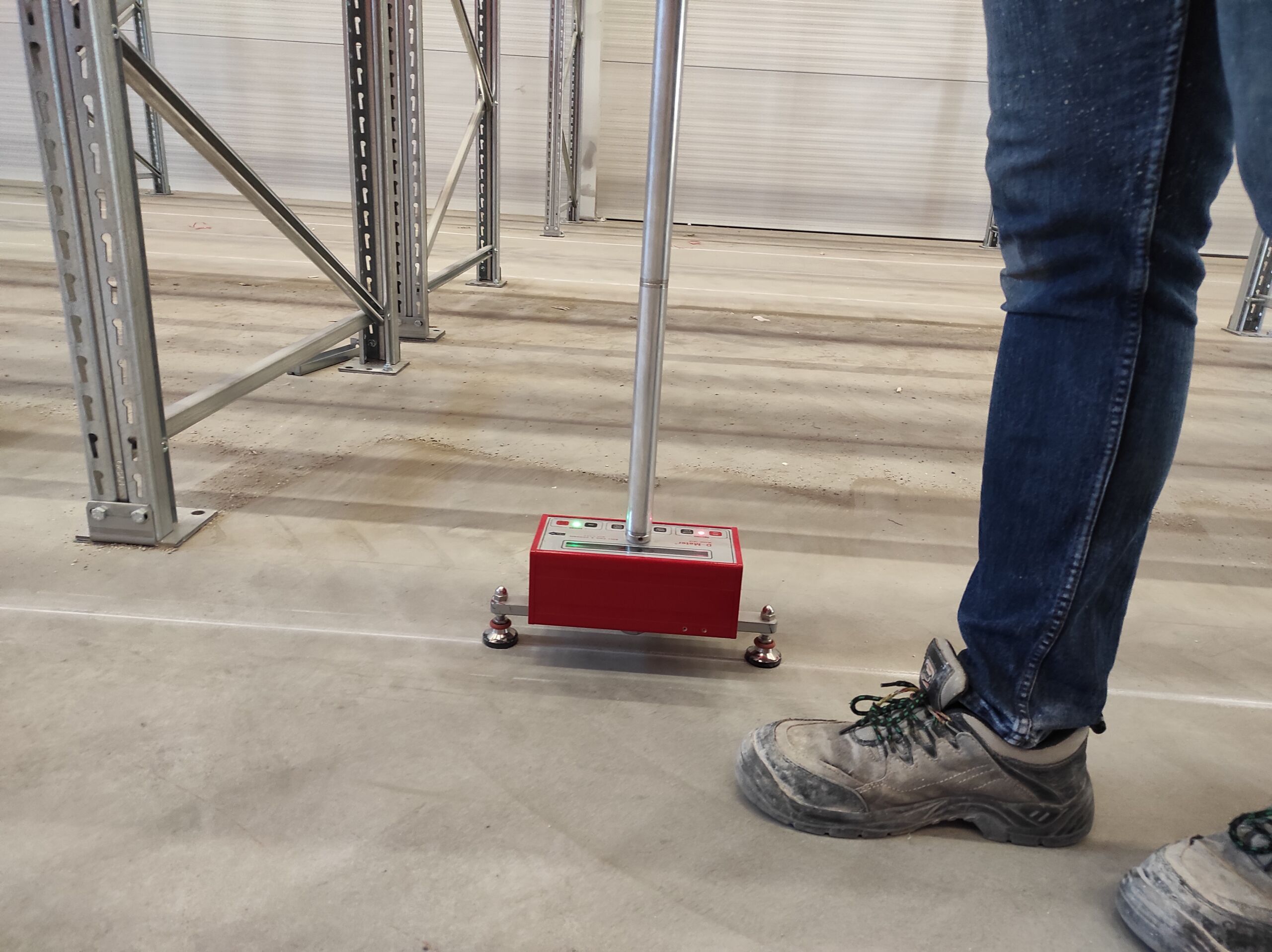 Scanning the industrial concrete floor with the D-meter walking floor profiler